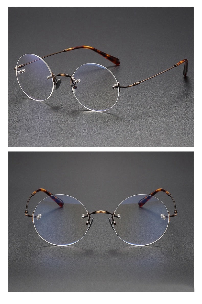 Black unisex round pure titanium rimless glasses, product view