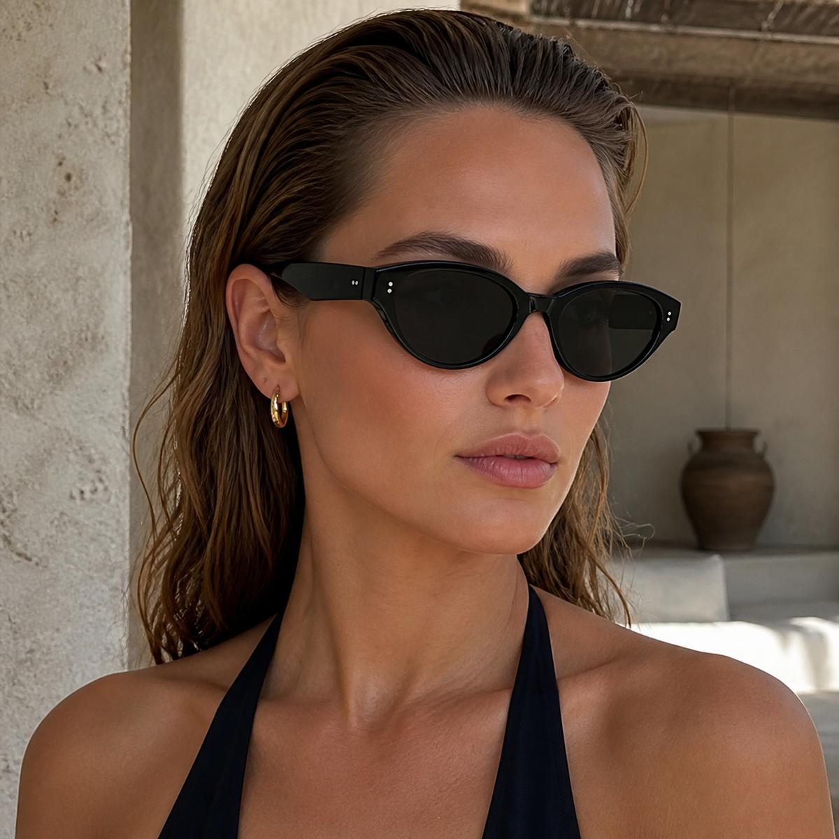 Women’s Black full-rim narrow cat-eye sunglasses, front adult model fit