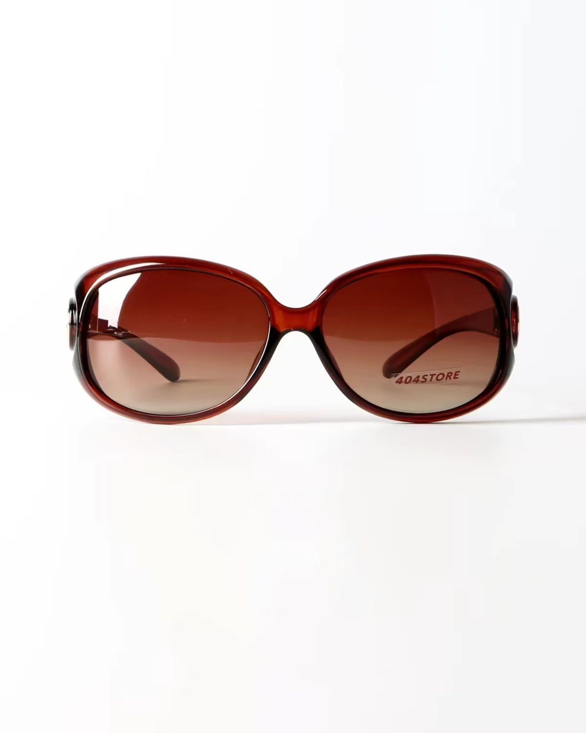 Women’s Amber Brown full-rim oversized oval sunglasses, front view
