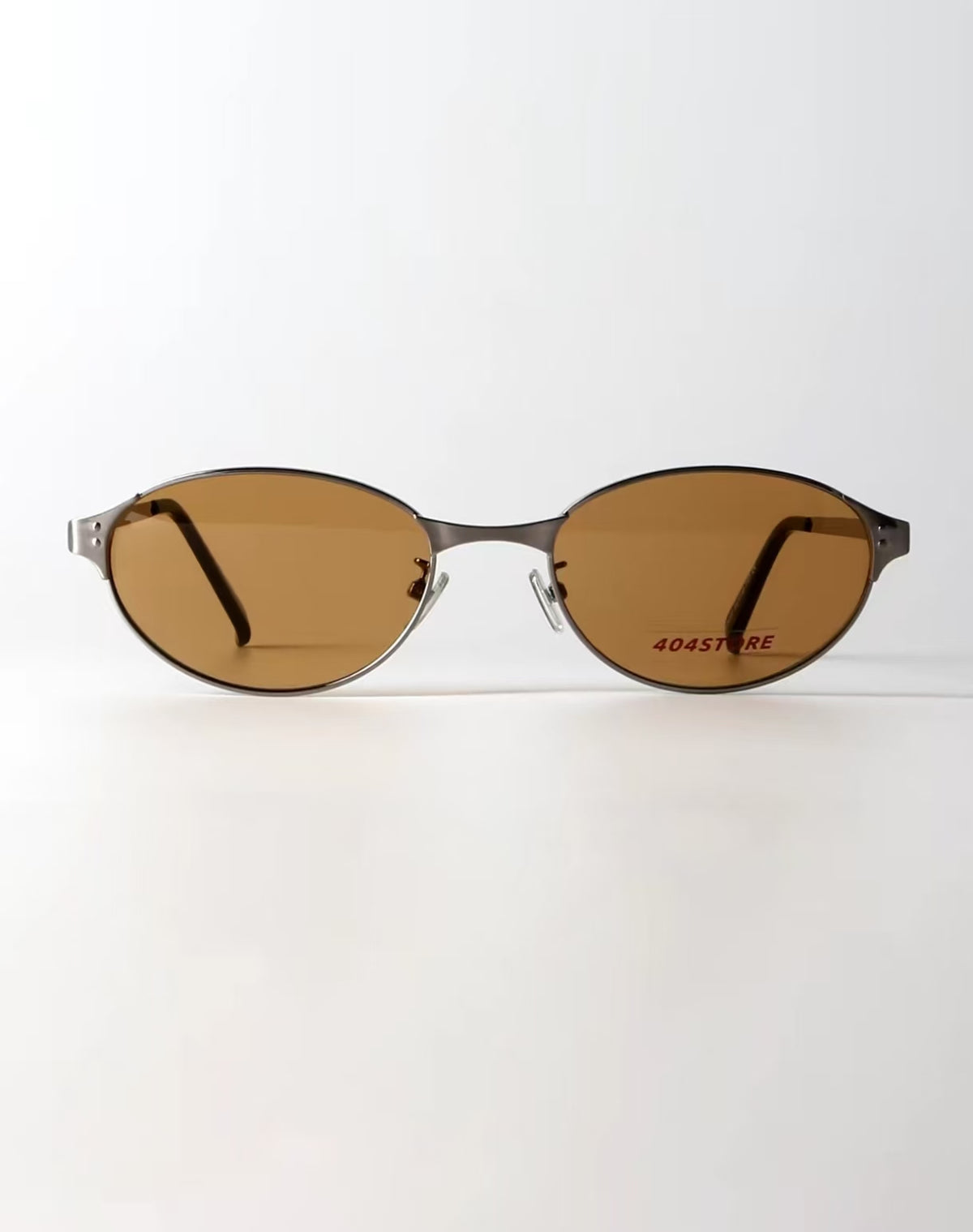 Women’s Amber Brown full-rim slim oval sunglasses, front view