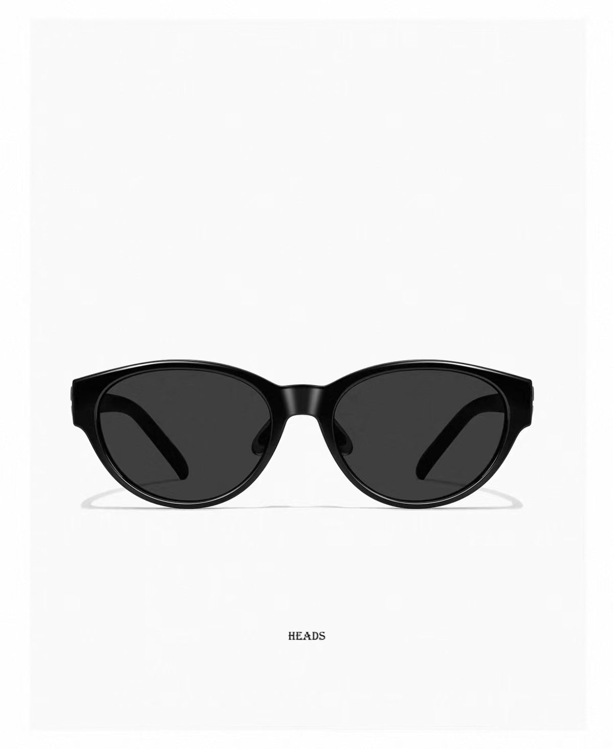 Women’s Glossy Black full-rim cat-eye sunglasses, front and three-quarter views