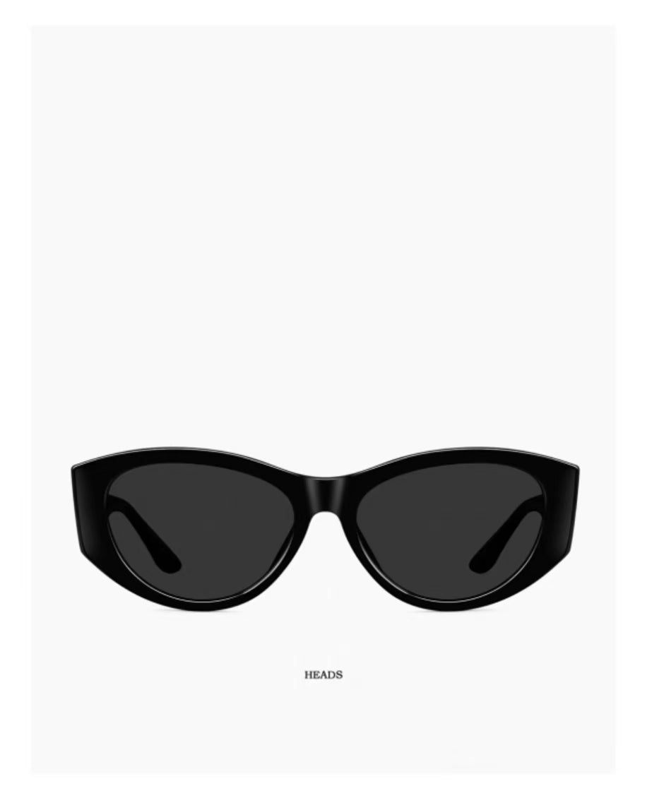 Women’s Glossy Black full-rim narrow cat-eye sunglasses, front and three-quarter views