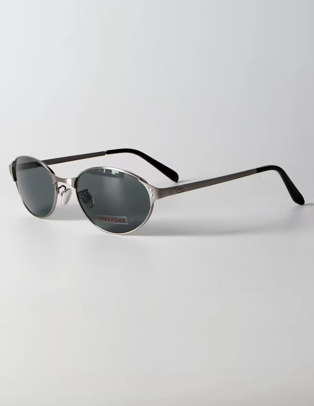 Women’s Gray full-rim slim oval sunglasses, three-quarter view
