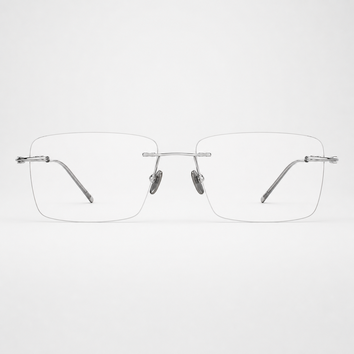Silver pure titanium rimless shallow rectangular eyeglasses, straight-on product view