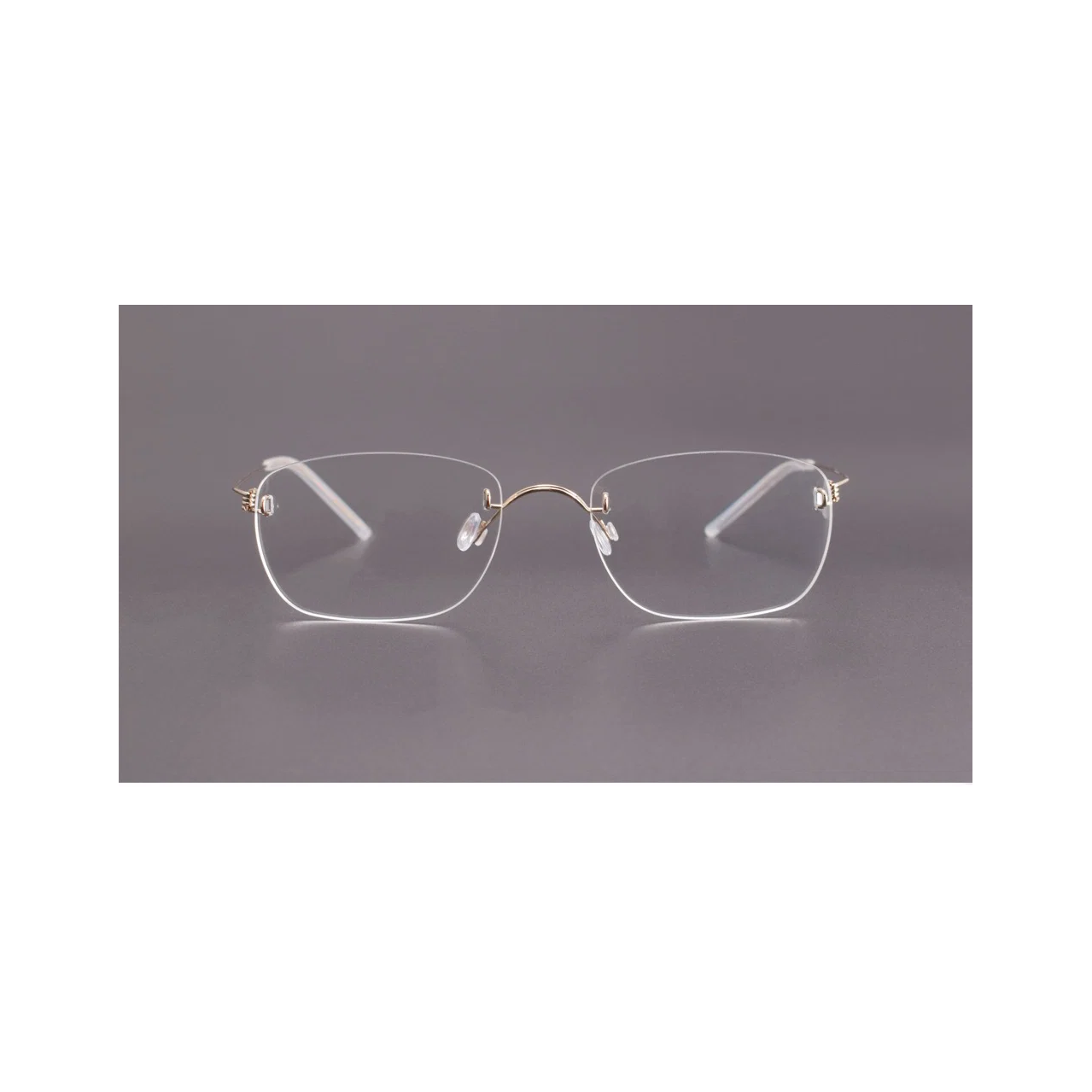 Gold men's titanium rimless spring-hinge glasses, front product view