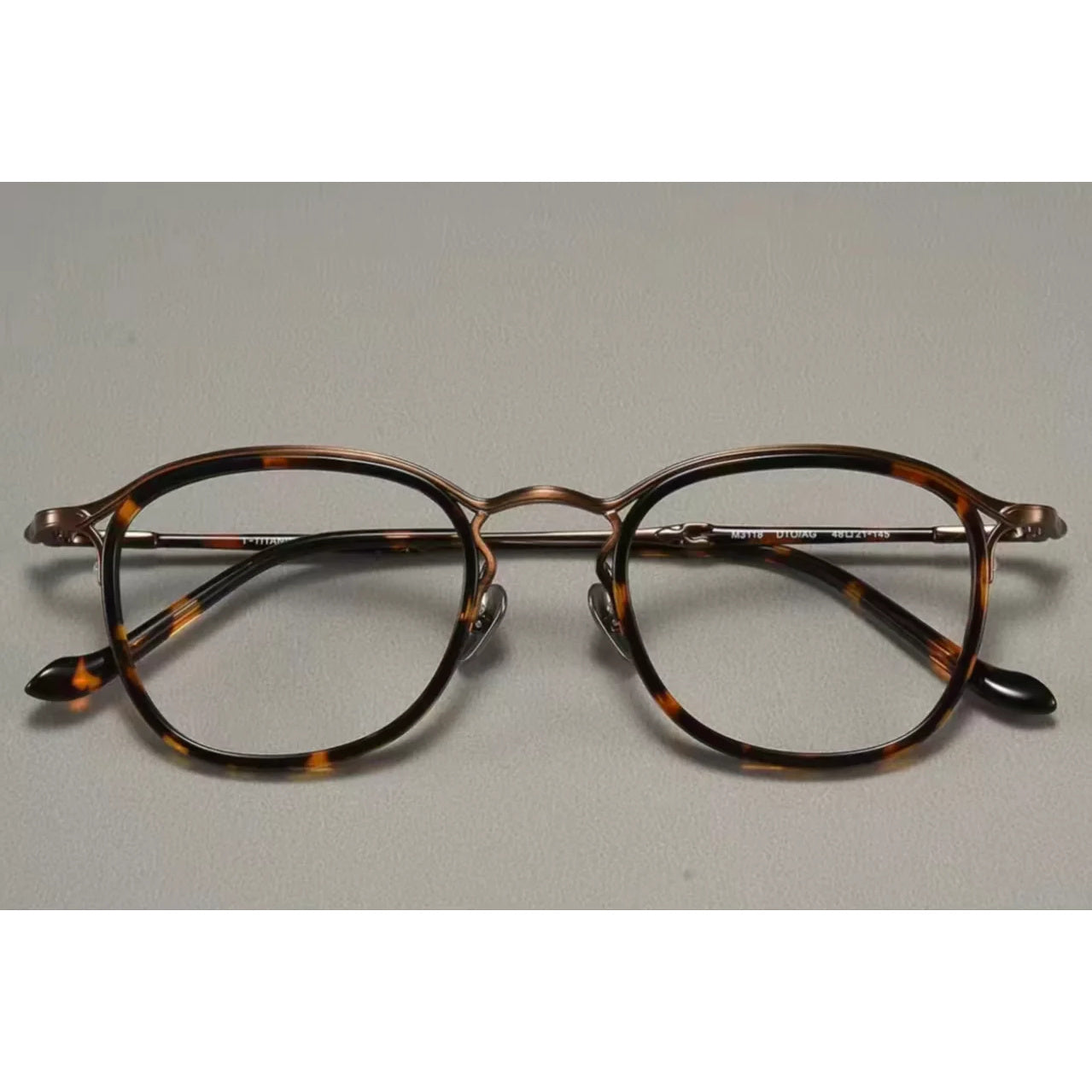 Tortoise Shell men's titanium-acetate full-rim round-square glasses, front product view