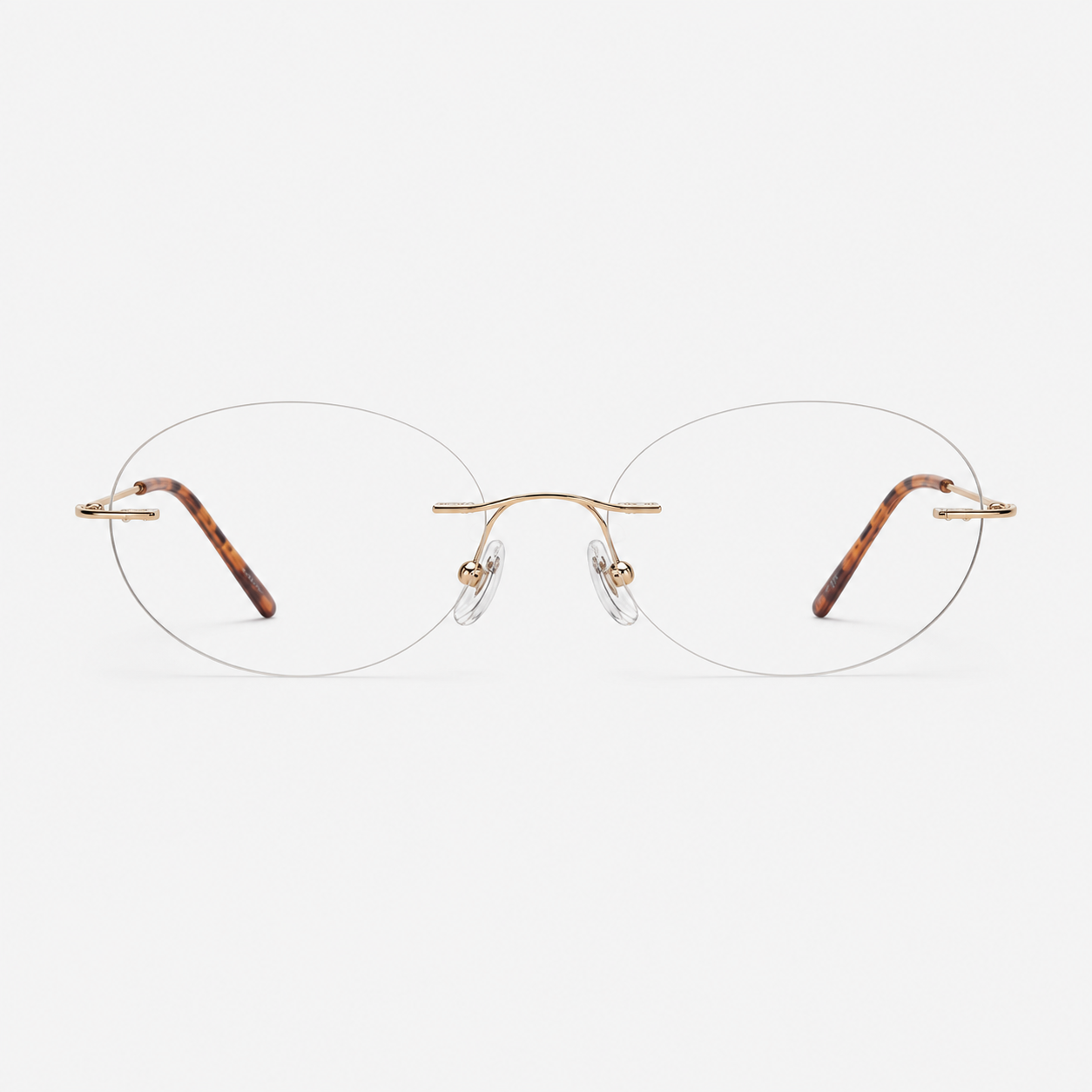 Gold/Tortoise women's titanium rimless oval glasses, front product view