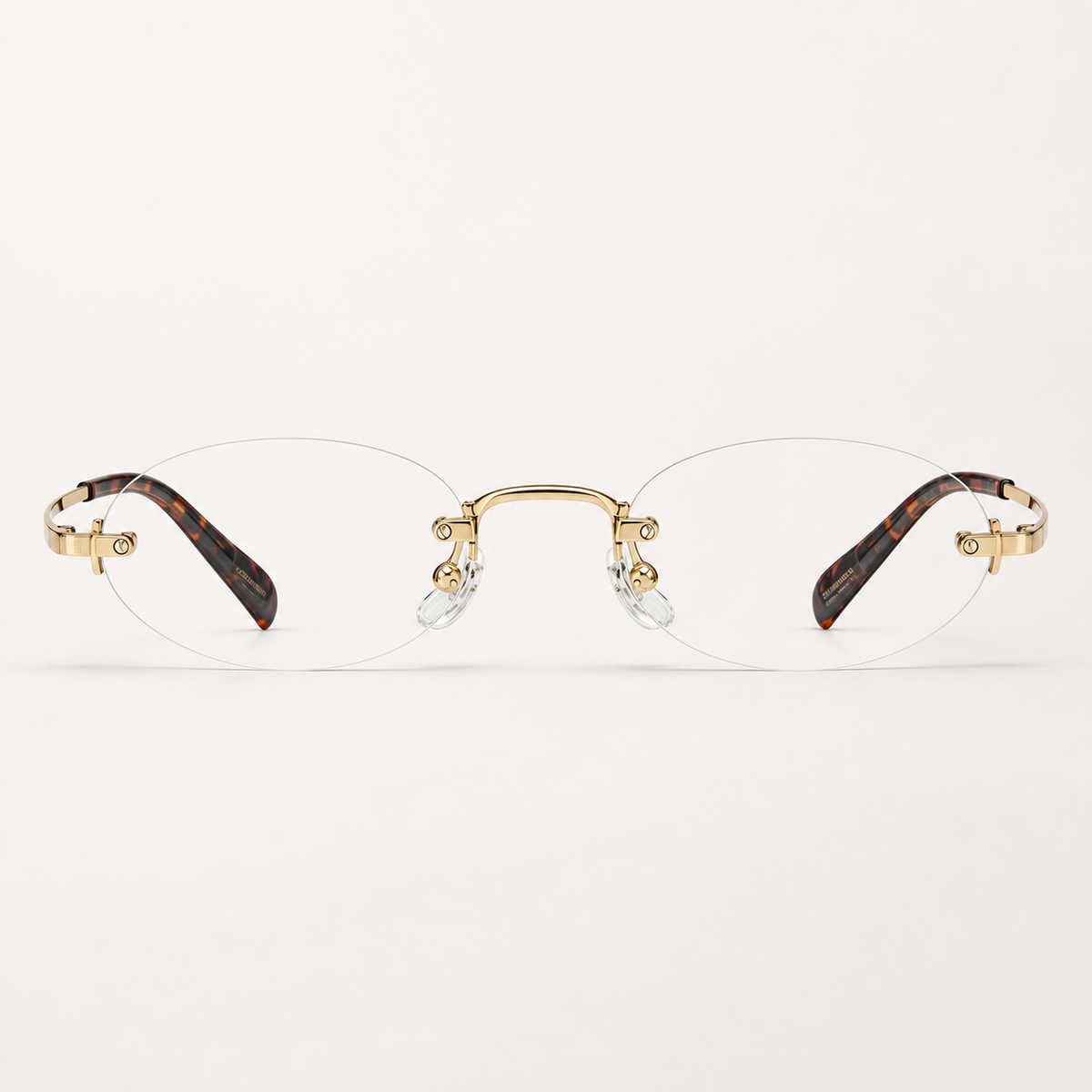 Gold/Leopard women's titanium rimless narrow oval glasses, front product view