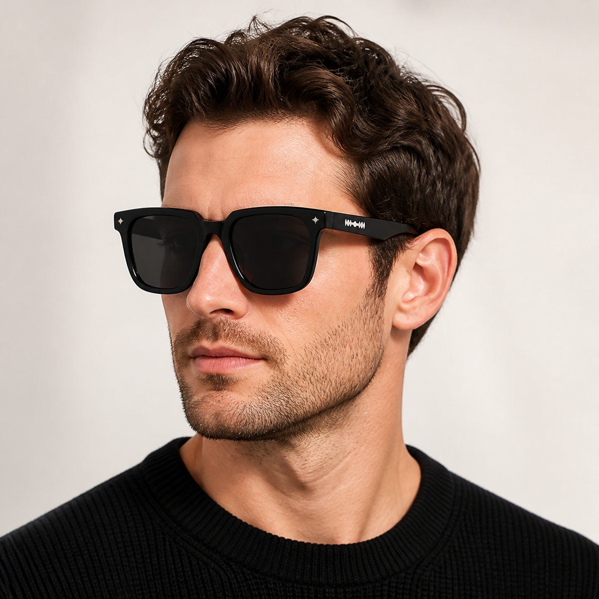 Men’s Black sunglasses worn by an adult White man