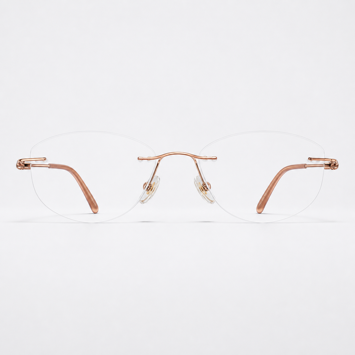 Rose Gold women's titanium alloy rimless soft butterfly glasses, front product view