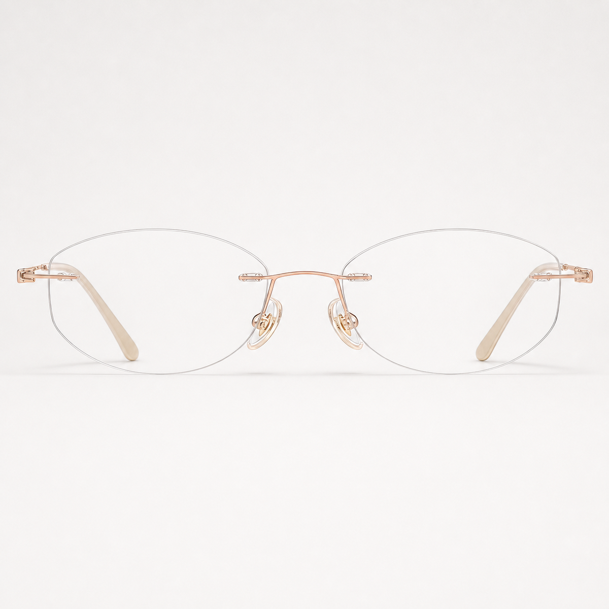 Rose Gold women's pure titanium rimless soft rectangular glasses, front product view