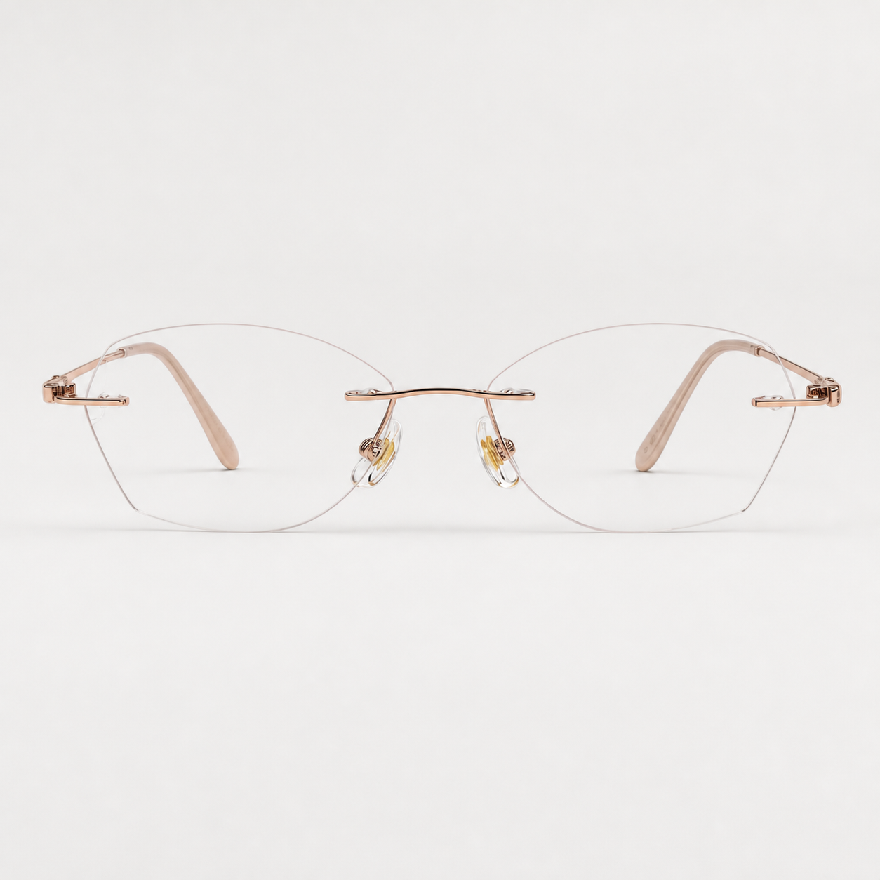 Gold women's titanium alloy rimless soft geometric glasses, front product view