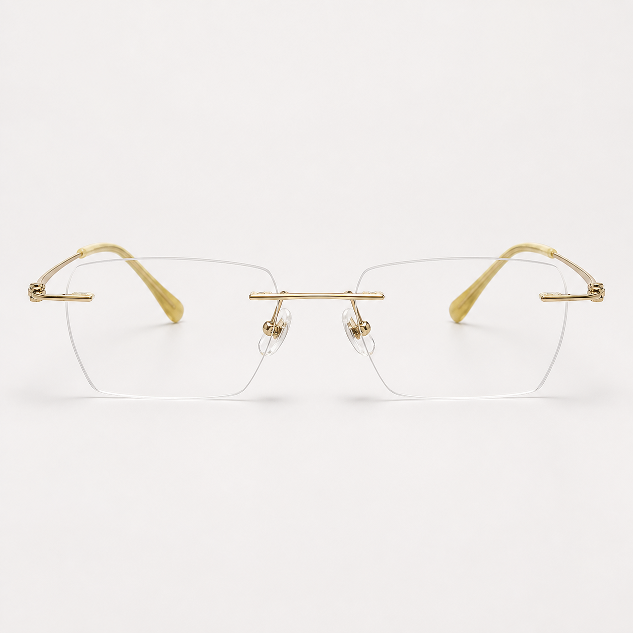 Gold men's pure titanium and lightweight acetate rimless geometric glasses, front product view