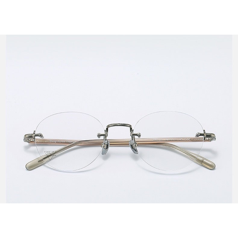 Antique Bronze/Brown Women's Titanium-Acetate Rimless Rounded Glasses, clean front product view