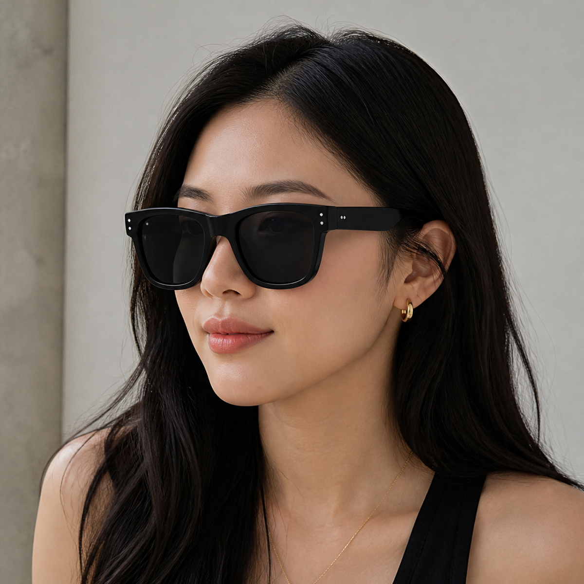 Black Women's Polycarbonate Oversized UV400 Sunglasses, worn by an adult model, front fit