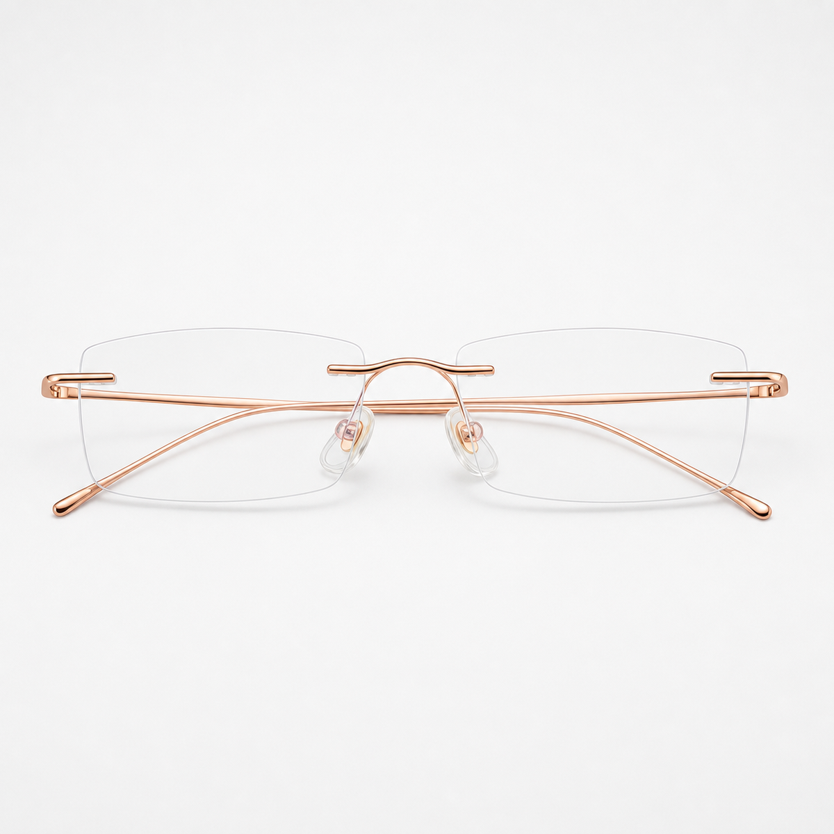 Rose Gold beta-titanium rectangular rimless glasses, front product view