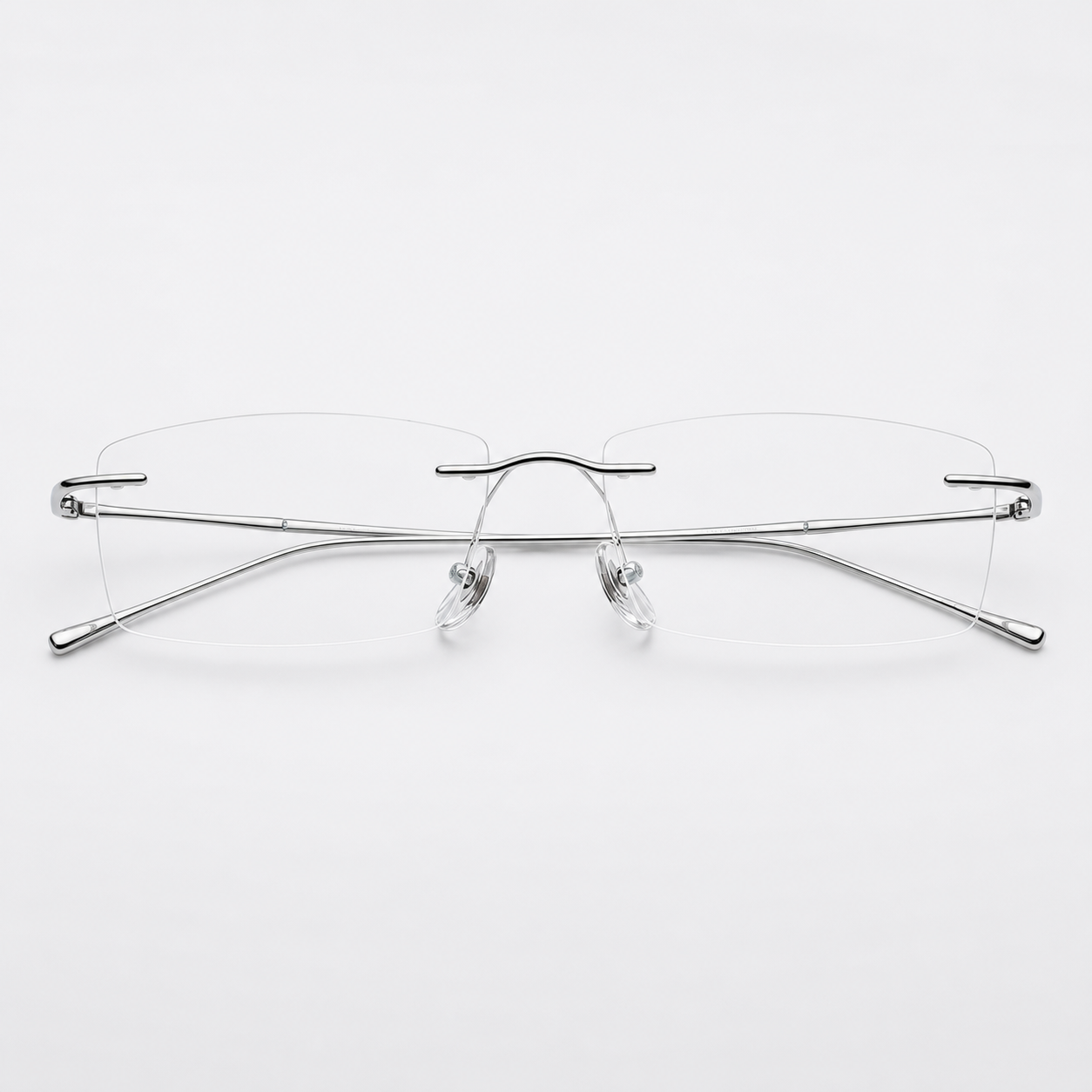 Silver beta-titanium rectangular rimless glasses, front product view