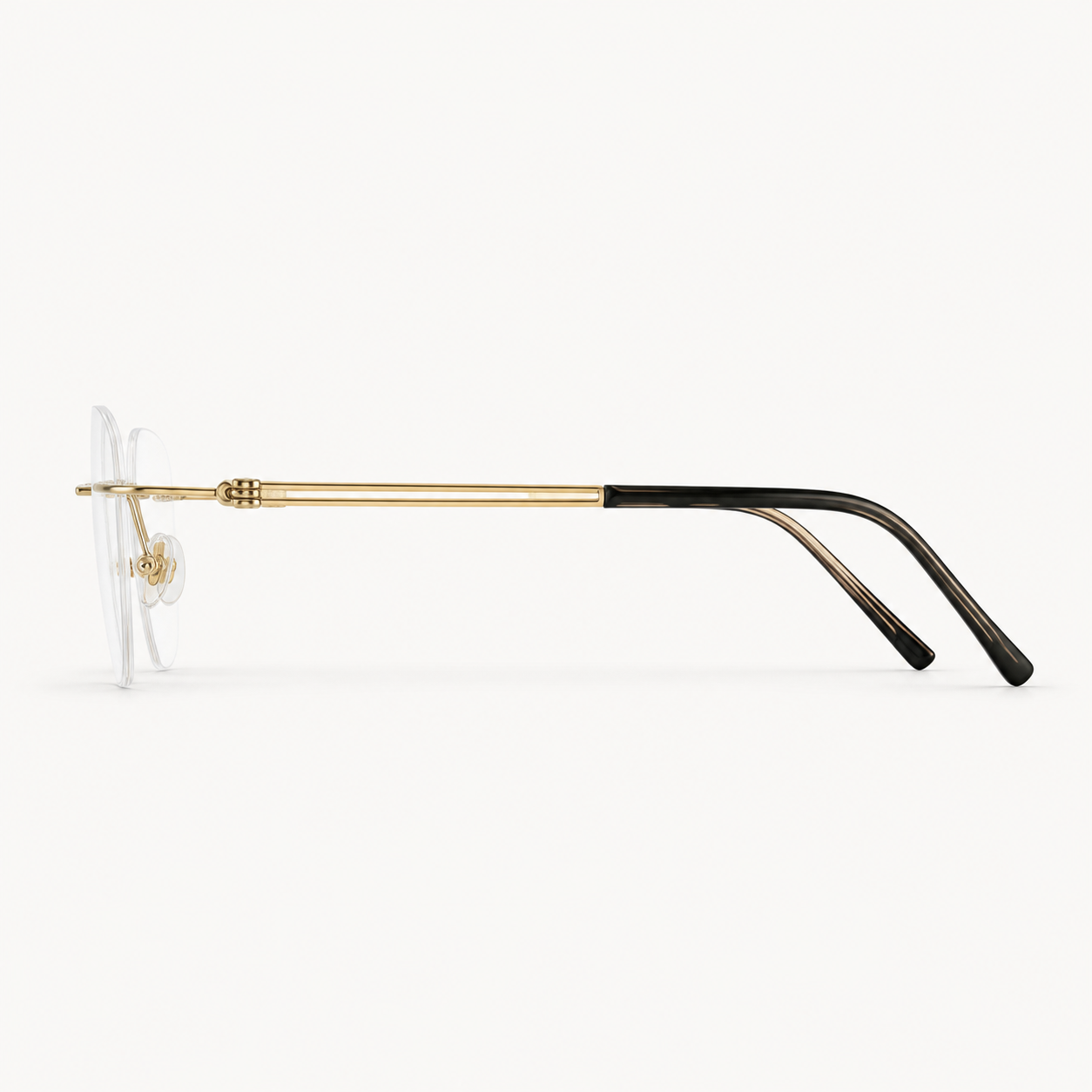 Gold titanium rimless rounded-rectangle eyeglasses, side-profile product view