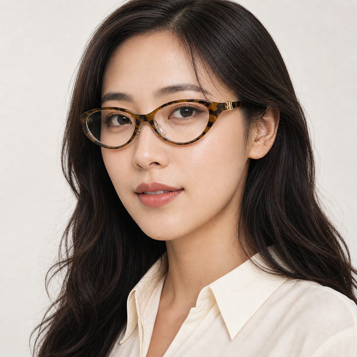 Tortoise Shell women's retro TR90 oval cat-eye full-rim glasses worn by an adult East Asian Woman