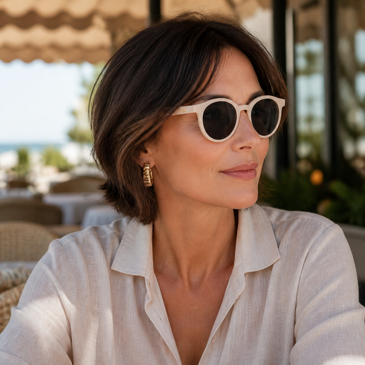 Women’s Ivory full-rim oval sunglasses, three-quarter adult model fit