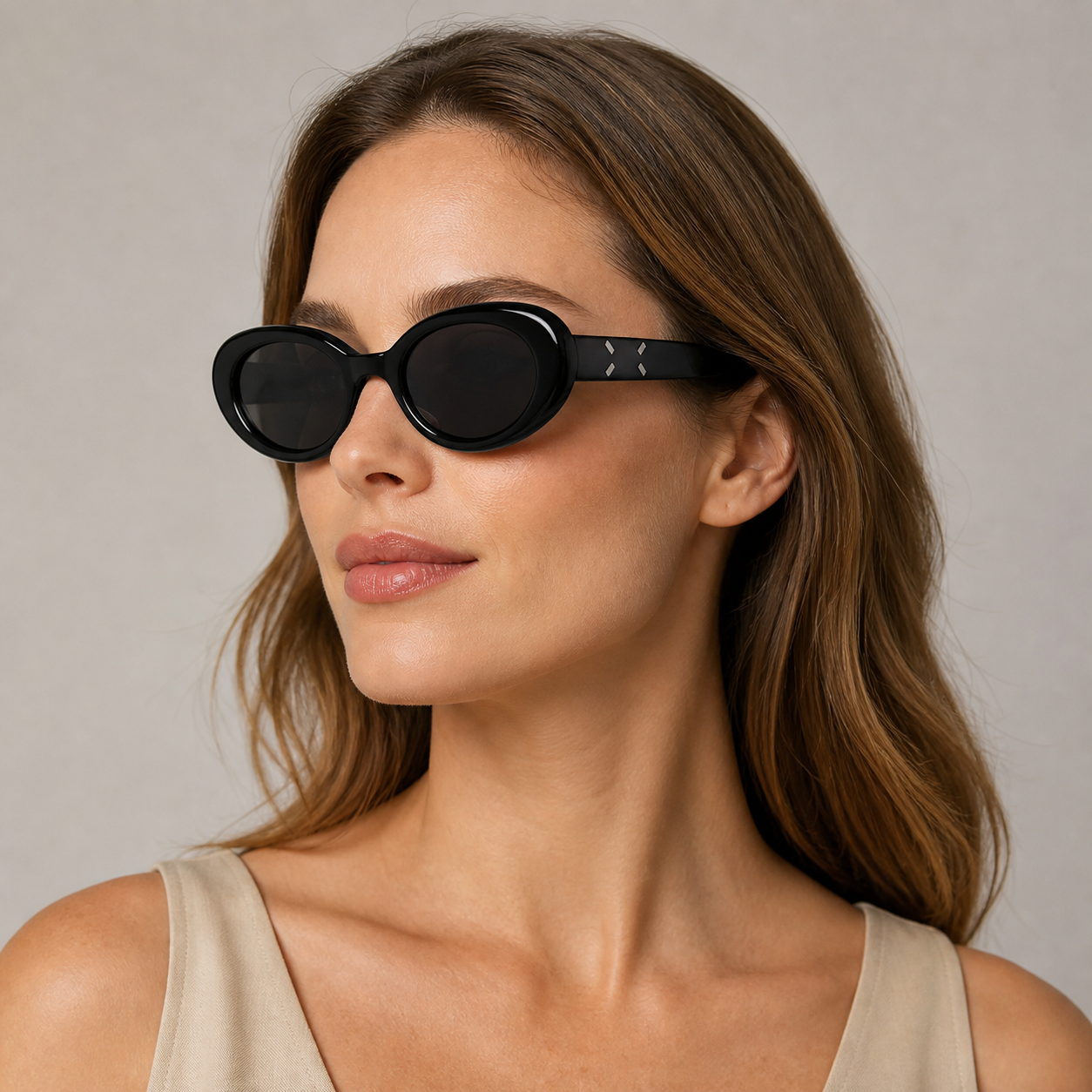 Black Women's Oval PC UV400 Sunglasses, angled adult model view